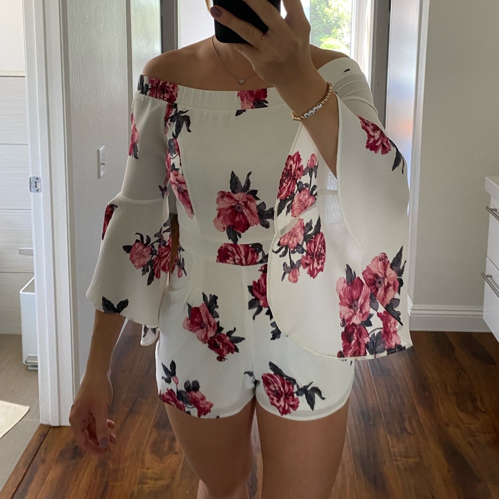 Off the shoulder floral print romper. Size XS